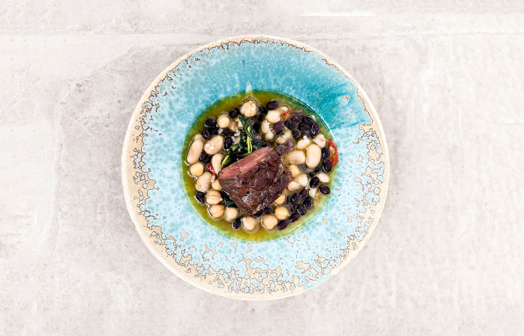 GRILLAD LAMMENTRECOTE MED WOKADE CITRON- OCH ROSMARINBÖNOR