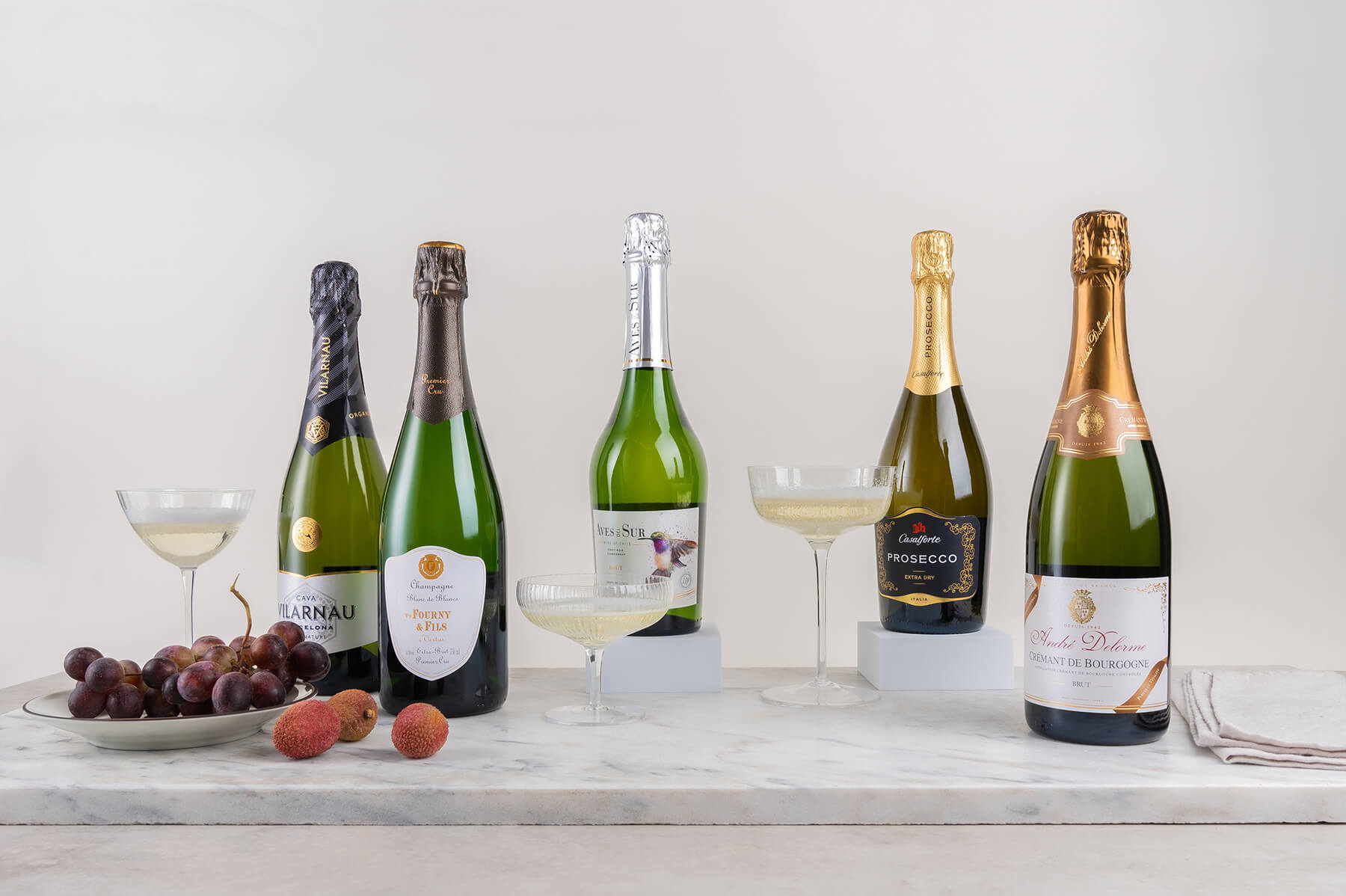 fem flaskor bubbel som kan passa bra som presenter eller julklapp
