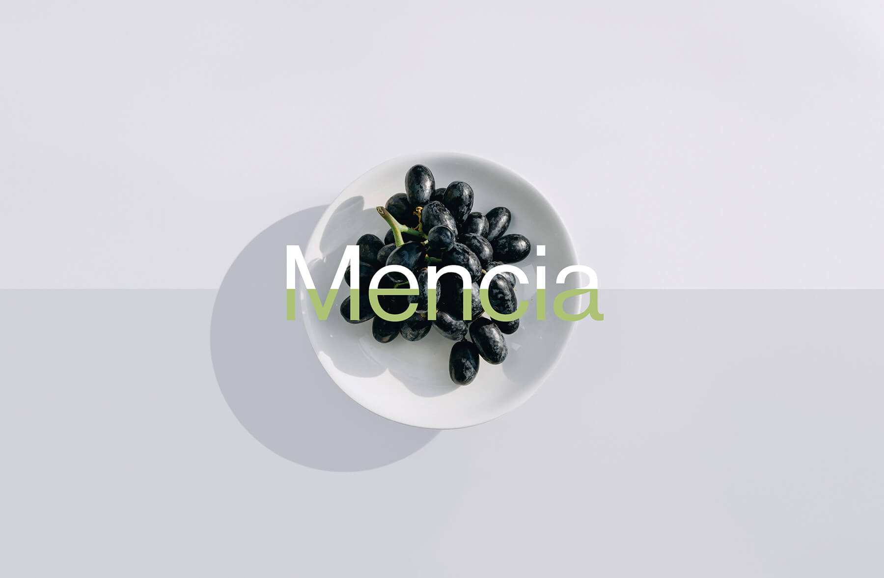 en skål med druvor och texten mencia vindruvan