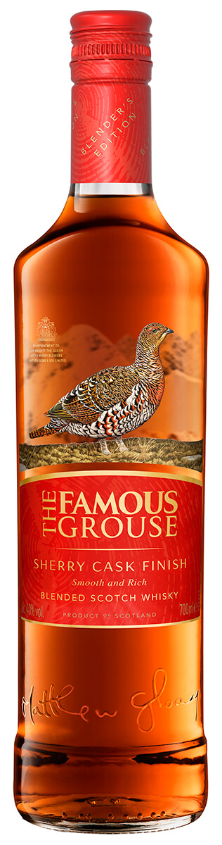 en flaska whisky med röd etikett