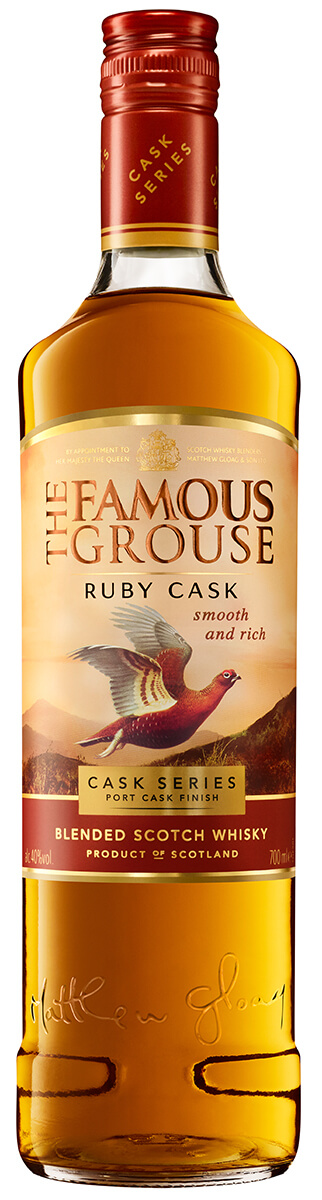 en flaska whisky med beige etikett